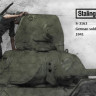 Stalingrad 3163 German soldier inspects T-34