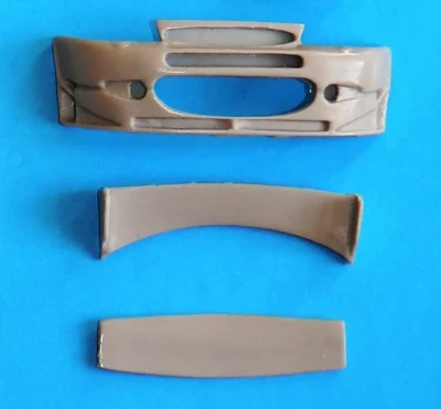 Reji Model JM940 Ford Escort WRC - front bumper &amp; rear wing 1/24
